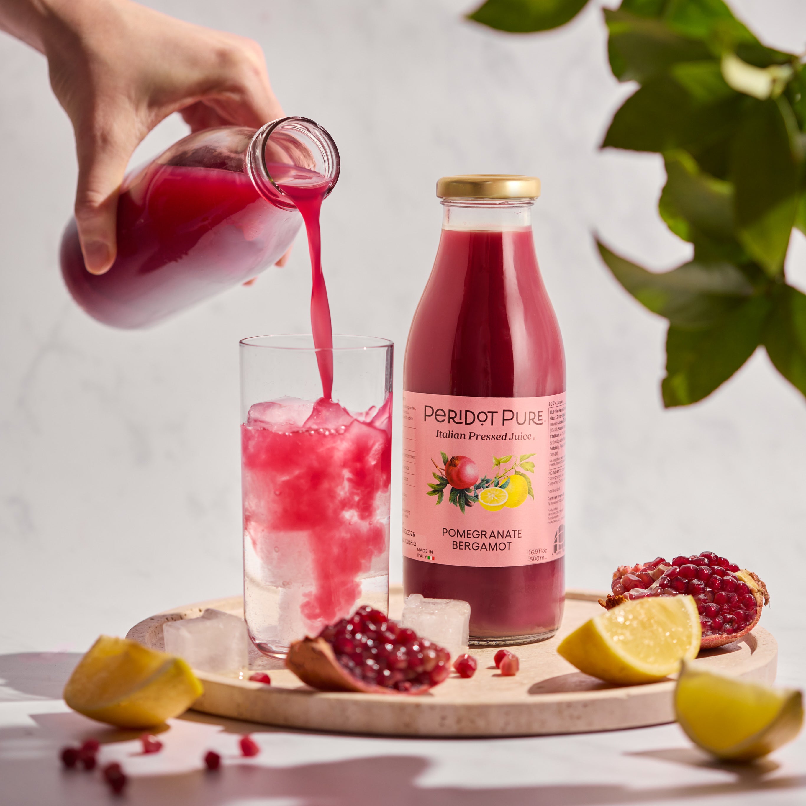 Peridot Pure Pomegranate Bergamot added to sparkling water