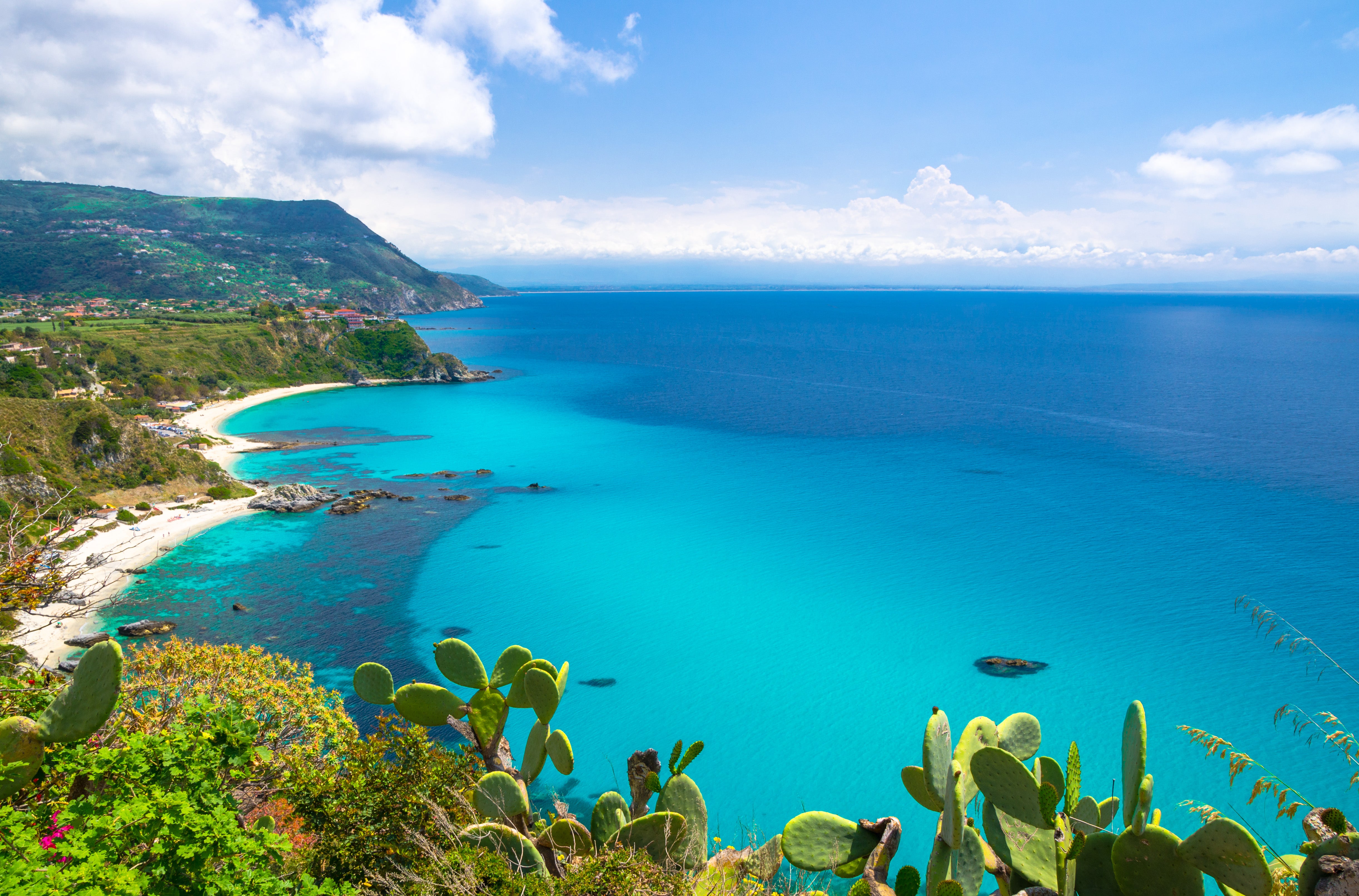 Aerial view of the Calabrian coastline in southern Italy, where Peridot Pure bergamot is grown
